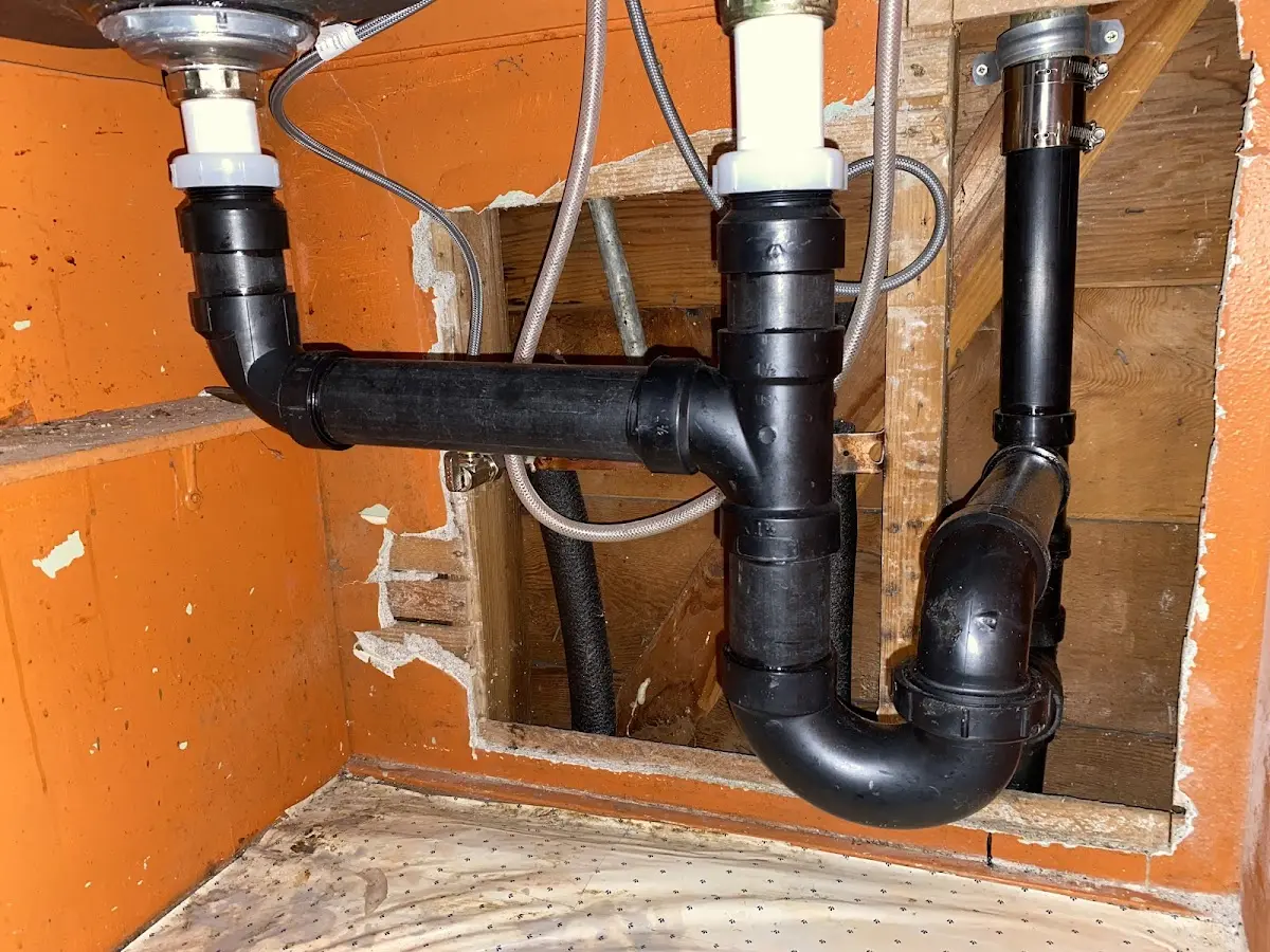 Professional Garbage Disposal Repair equipment and tools on the job in Neshannock